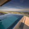 Infinity pool with views of the river and countryside.