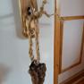Door handle with wooden grape pendant.