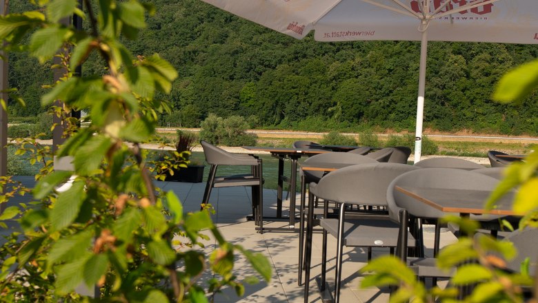 Tables on the terrace with green plants
