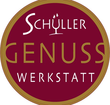 Schüller Genuss Werkstatt logo with red background and gold lettering.