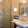 Hotel bathroom with shower and washbasin