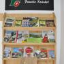 A shelf with brochures and a sign saying 'Welcome Krückel family'.