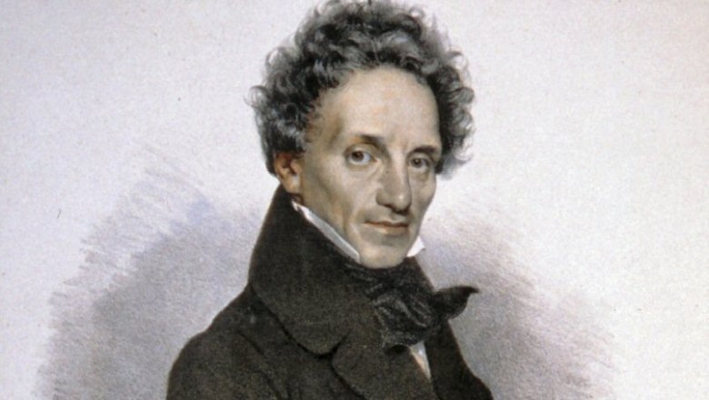 Portrait of a man in historical clothing with curly hair.