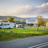 Campsite in Melk with mobile homes and a sign in the foreground.