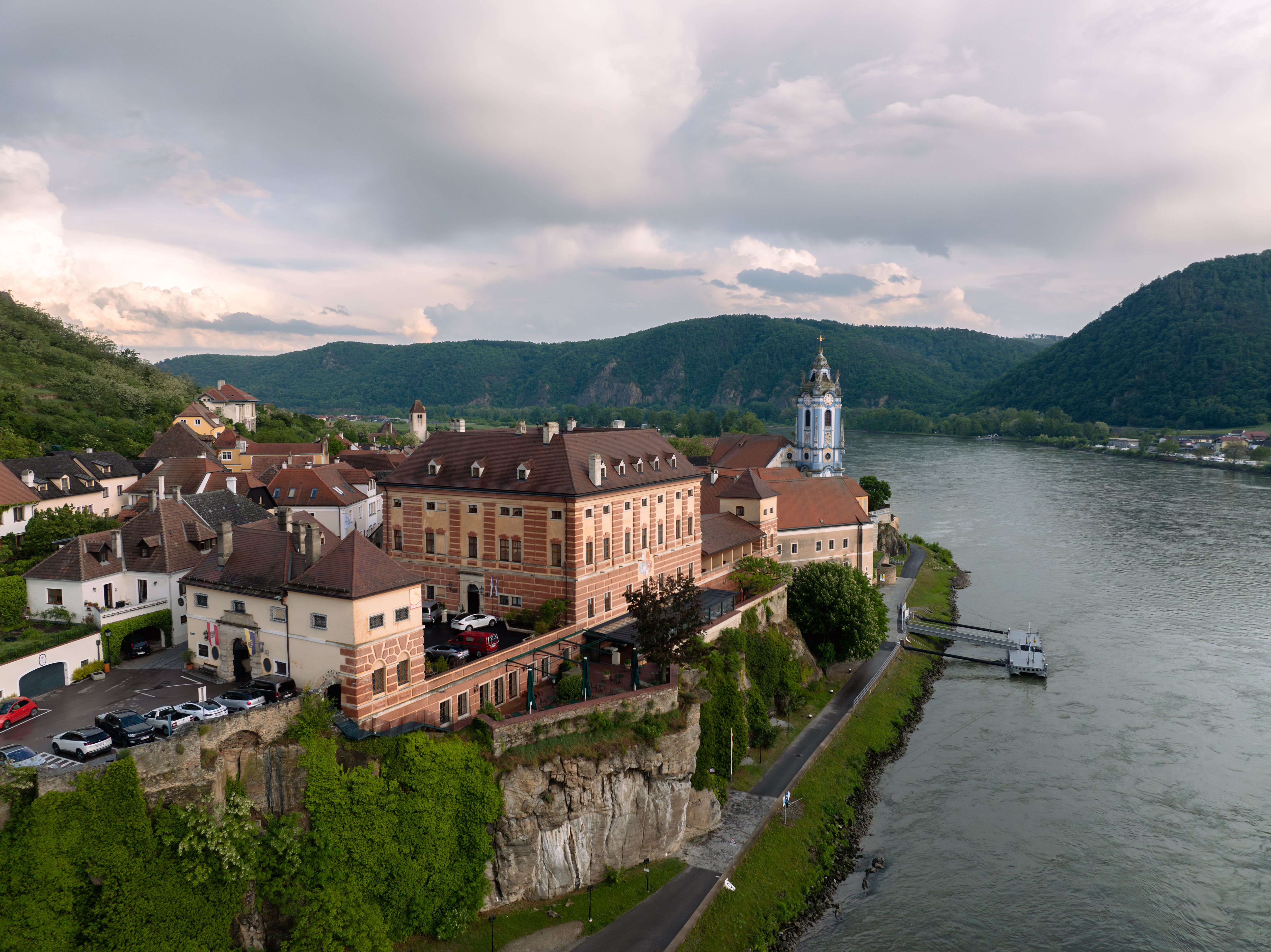 Aerial view of Dürnstein Castle on the Danube with surrounding landscape.