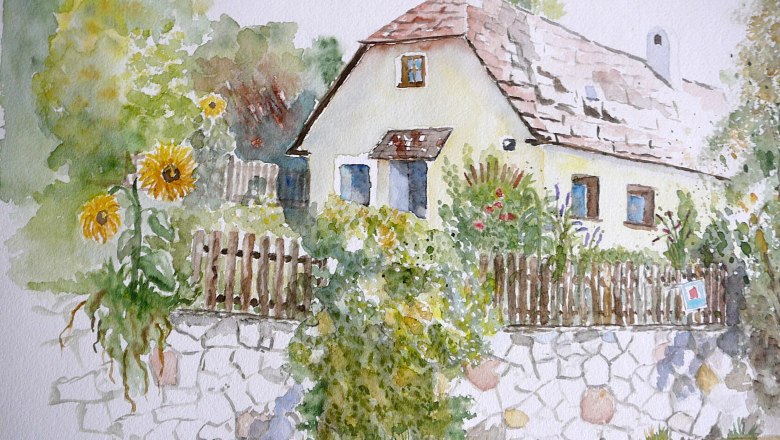 Watercolor of a house with garden and sunflowers.