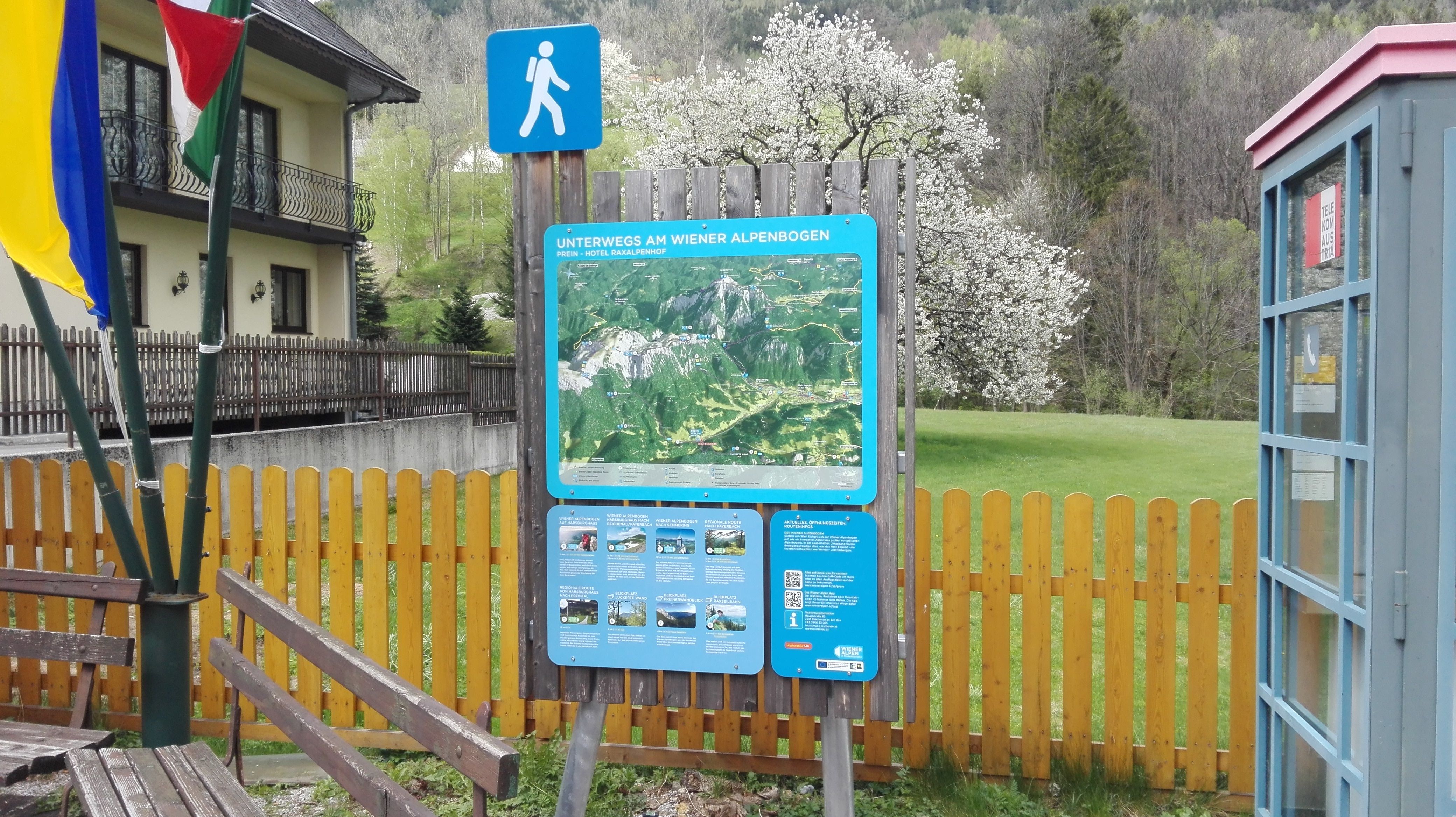 Hiking starting point Prein with information board and telephone box.