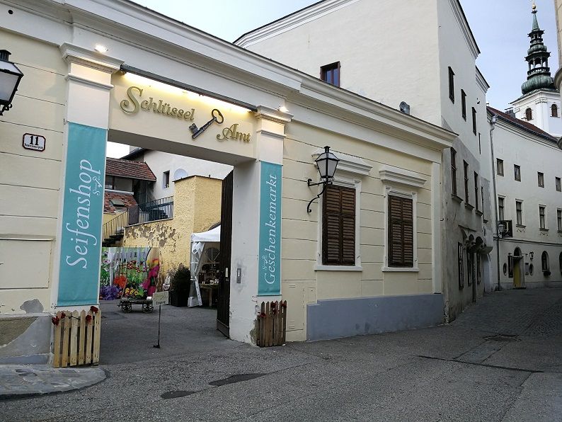 Entrance to the key office with signs for the soap store and gift market.
