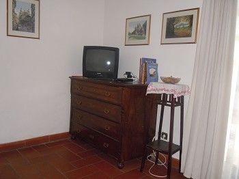 Living room/bedroom with access to the terrace