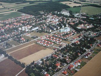 Aerial view of Ebergassing with houses and fields.