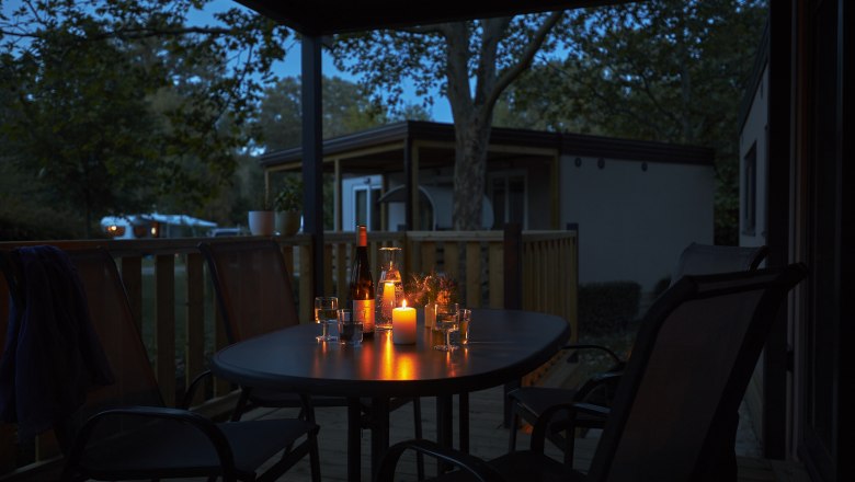 Romantic evening atmosphere on the terrace of a mobile home