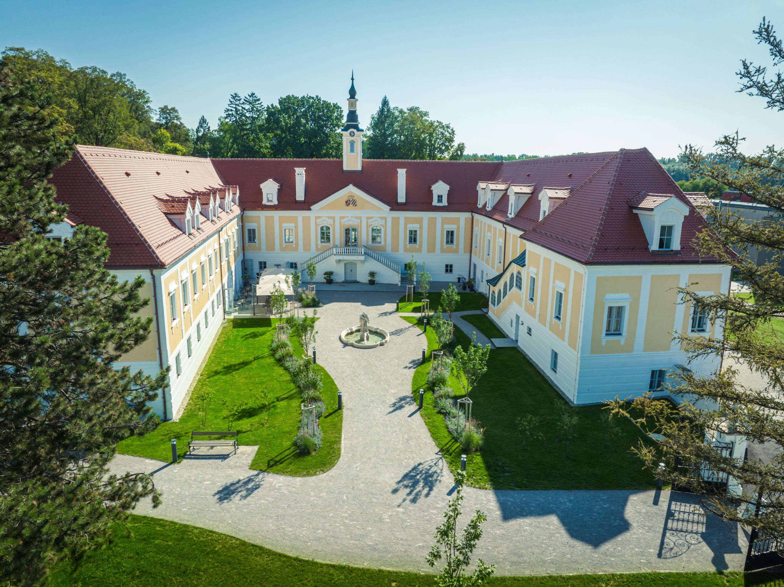 Aerial view of Haindorf Castle with inner courtyard and garden.