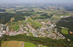 Aerial view of Kematen an der Ybbs, a rural community with fields and forests.