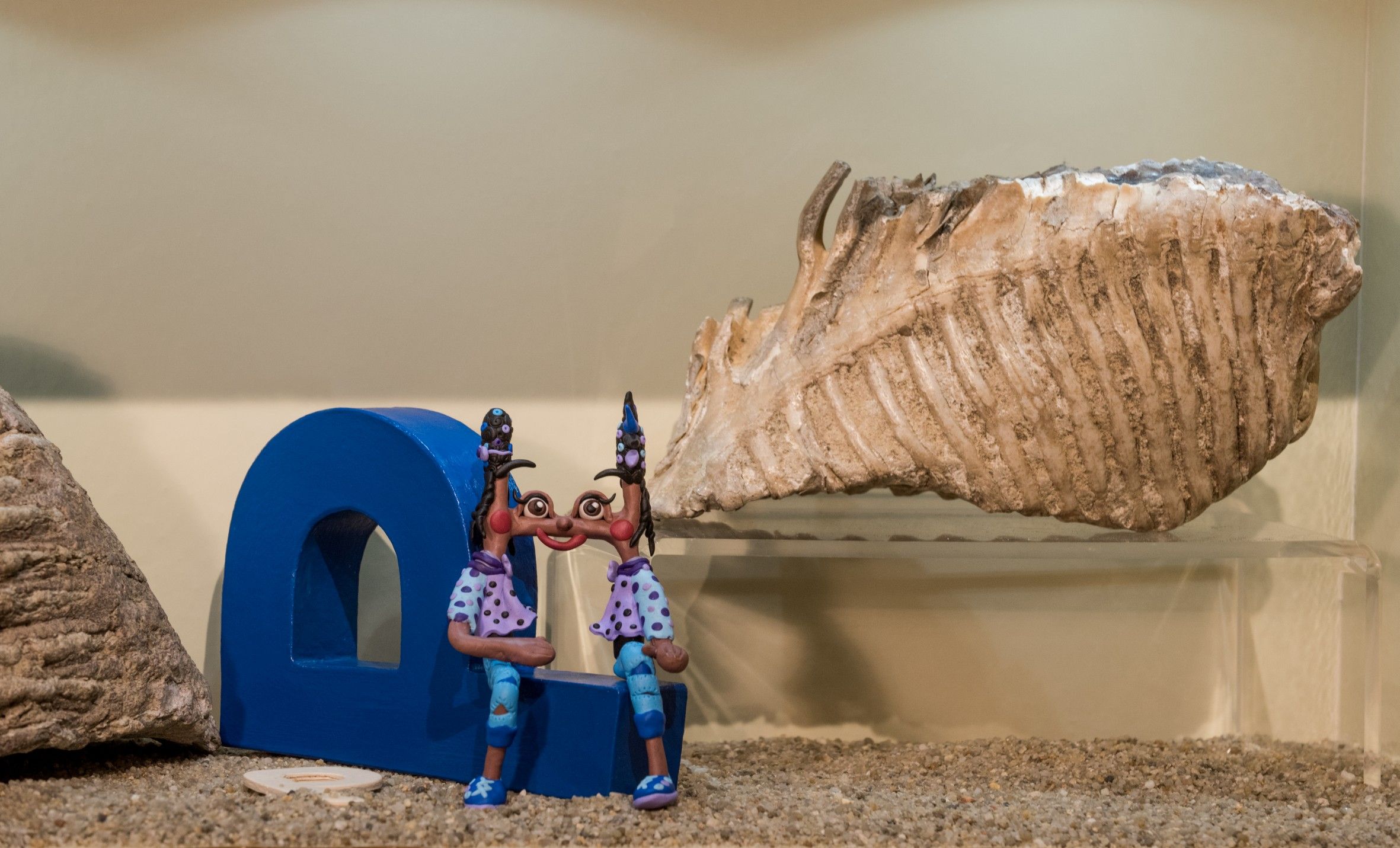 Mammoth tooth and museum mascot Momo Historica
