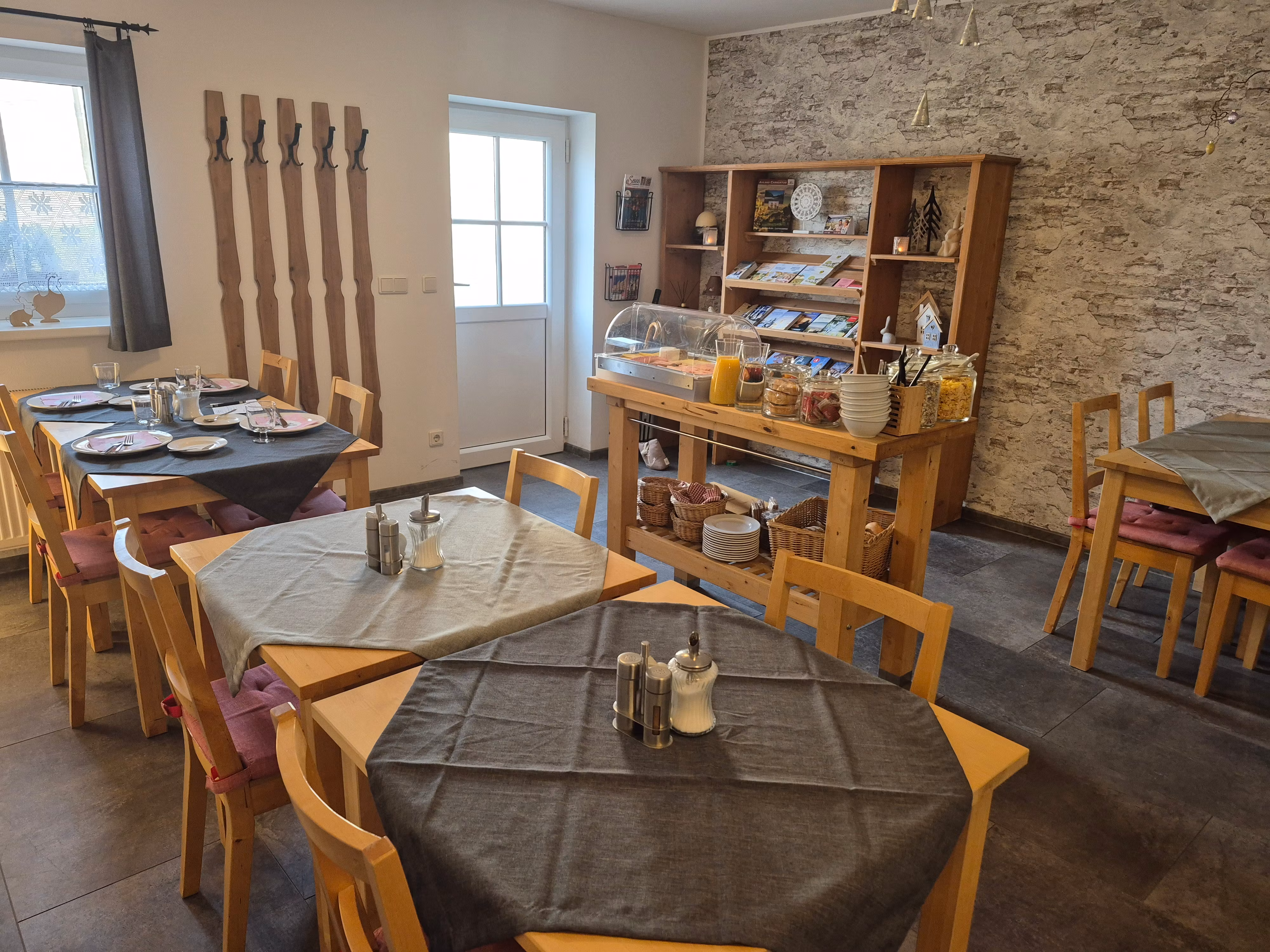 Tables in the breakfast room Gästezimmer Messermayer