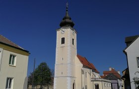 Rohrendorf parish church with blue sky in the background.