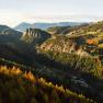 Aerial view of the Semmering Railway and Pollereswand in an autumnal landscape.