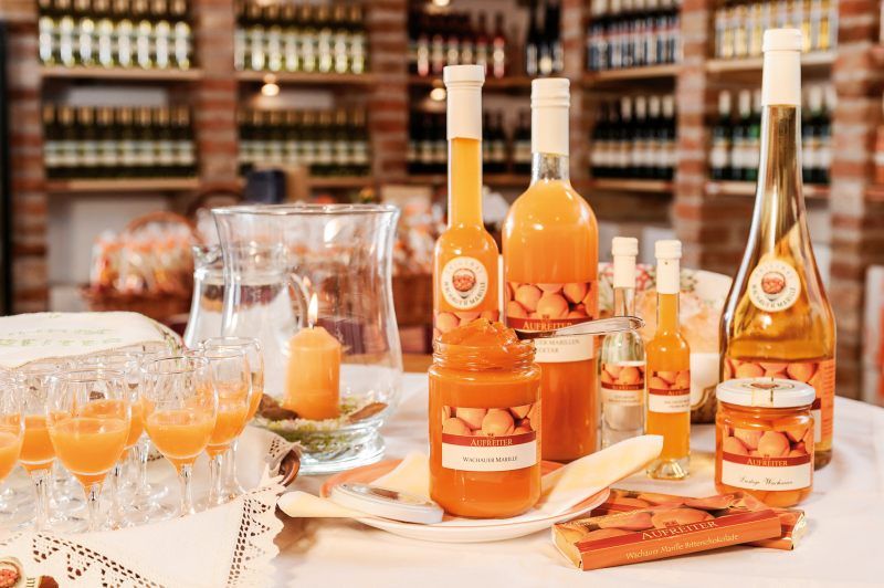 Various apricot products on a table in the farm store