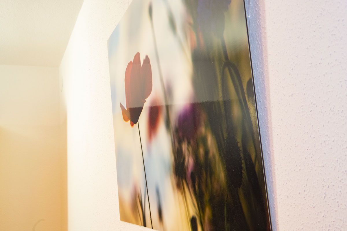 Close-up of a flower painting on a wall.