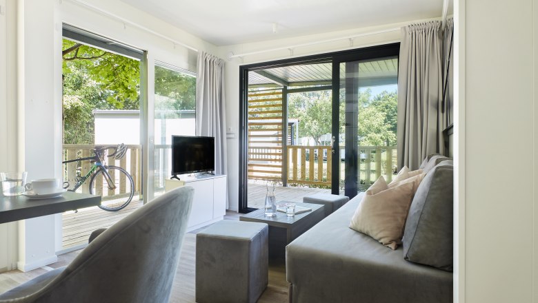 Interior view of the living area with a view of the green terrace