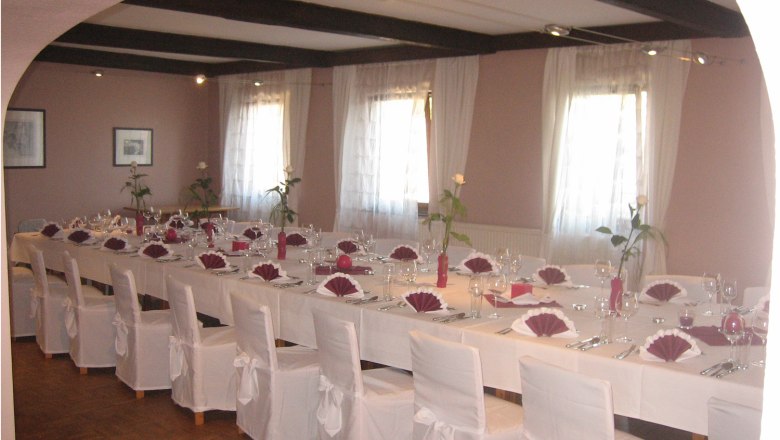 Elegant dining room with table setting for a celebration.