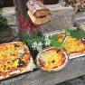 Homemade pizzas and breads. Bookable as a "pizza afternoon", &copy; Peter Brezina