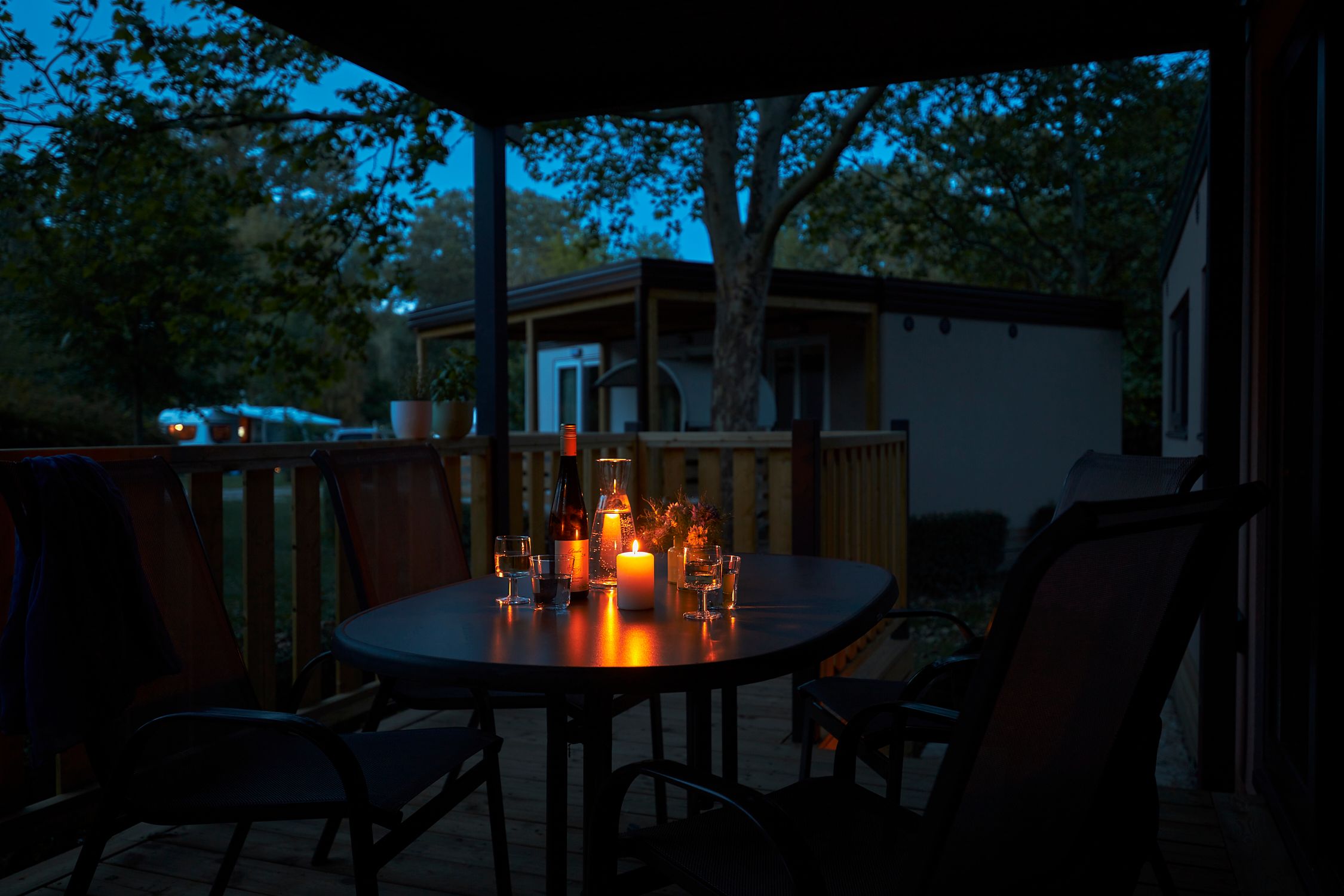 Romantic evening atmosphere on the terrace of a mobile home