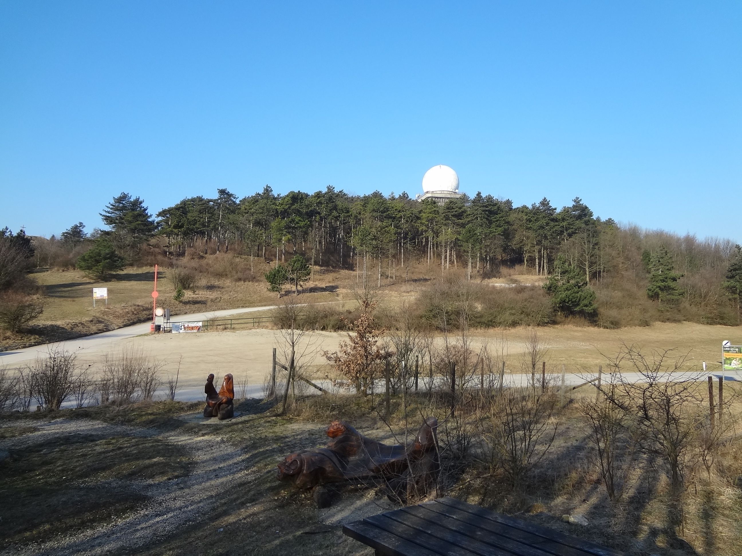 Landscape with hills, forest and radar dome on the Buschberg.