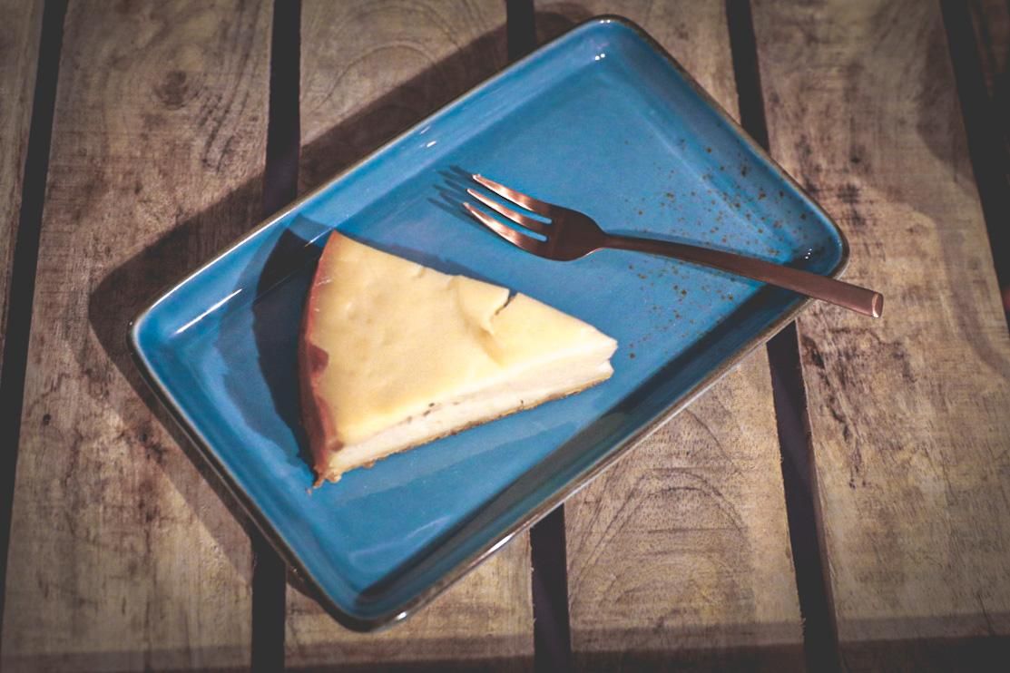 Piece of cake on a blue plate