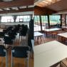 Two rooms with chairs and tables, one for presentations, the other for group work.