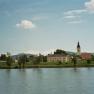 River landscape with church and bridge in Mautern, Austria.