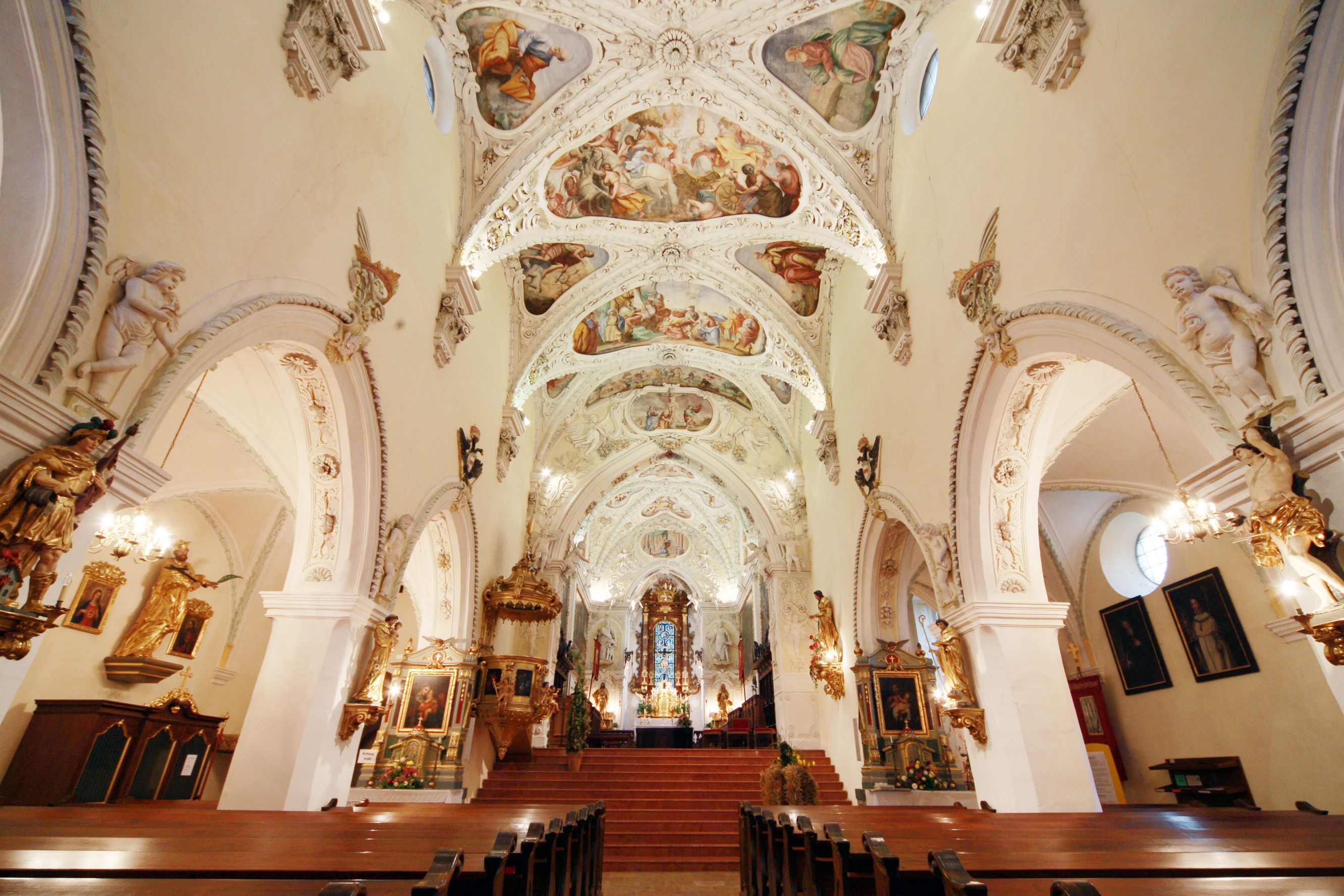 Interior view of Ardagger Abbey Church with its ornately painted ceiling and richly decorated walls.