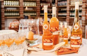 Various apricot products on a table in the farm store