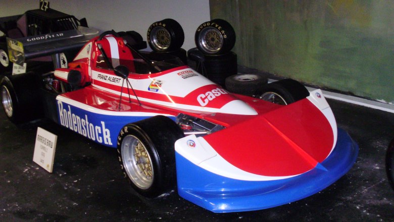 A red and white racing car with the inscription 'Rodenstock' in the Aspang Automobile Museum.