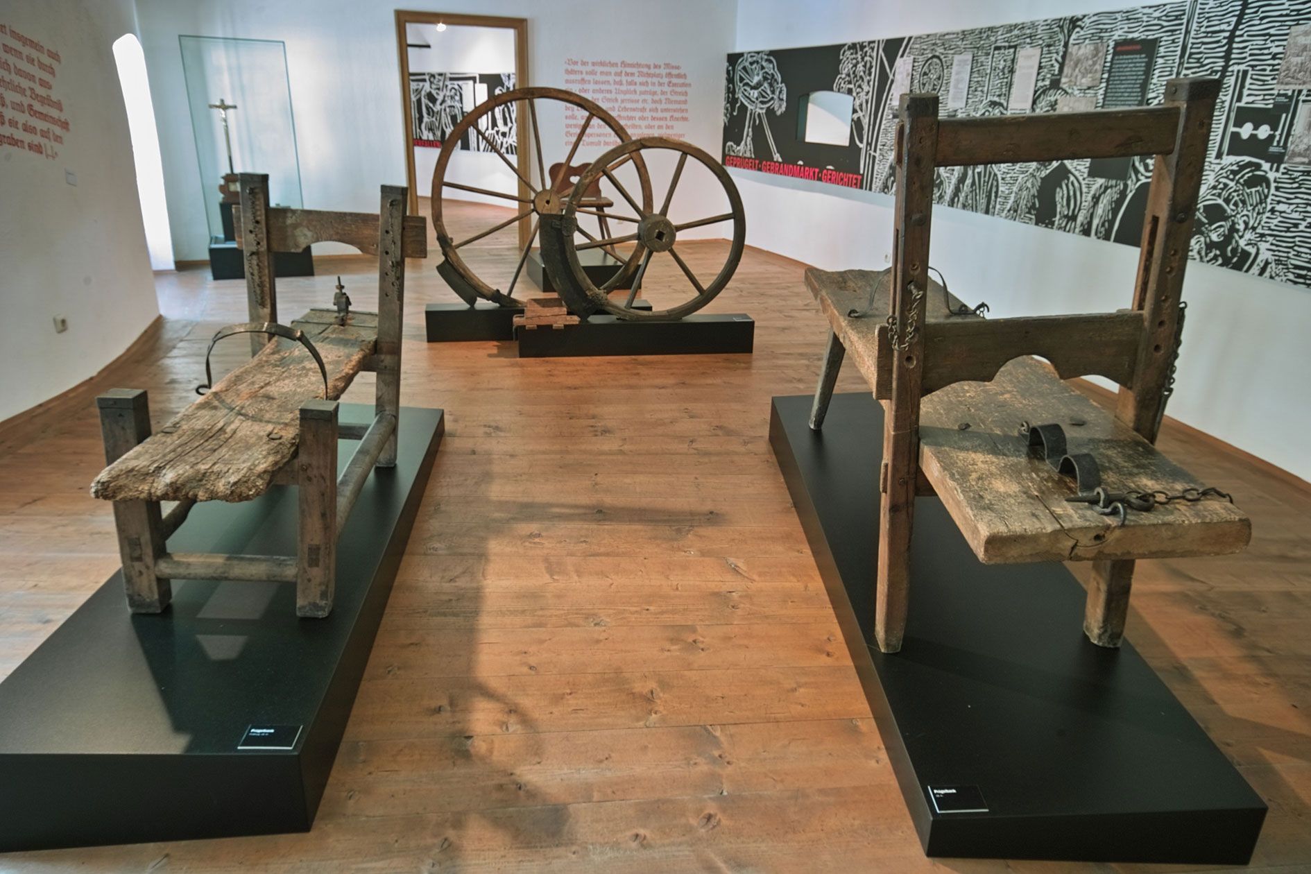 Exhibition of instruments of torture in a museum.