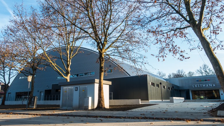 Exterior view of the Leithana sports area with bare trees in the foreground.