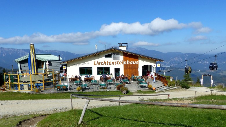 Liechtensteinhaus with terrace and cable car in the mountains.