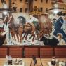 Wall painting in an inn with historical scenes of beer delivery by horse-drawn carriage.
