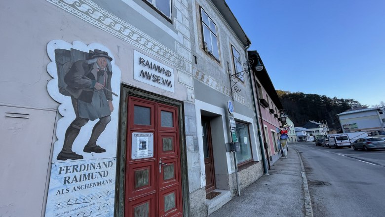 Exterior view of the Raimund Museum with mural of Ferdinand Raimund as Cinderman.