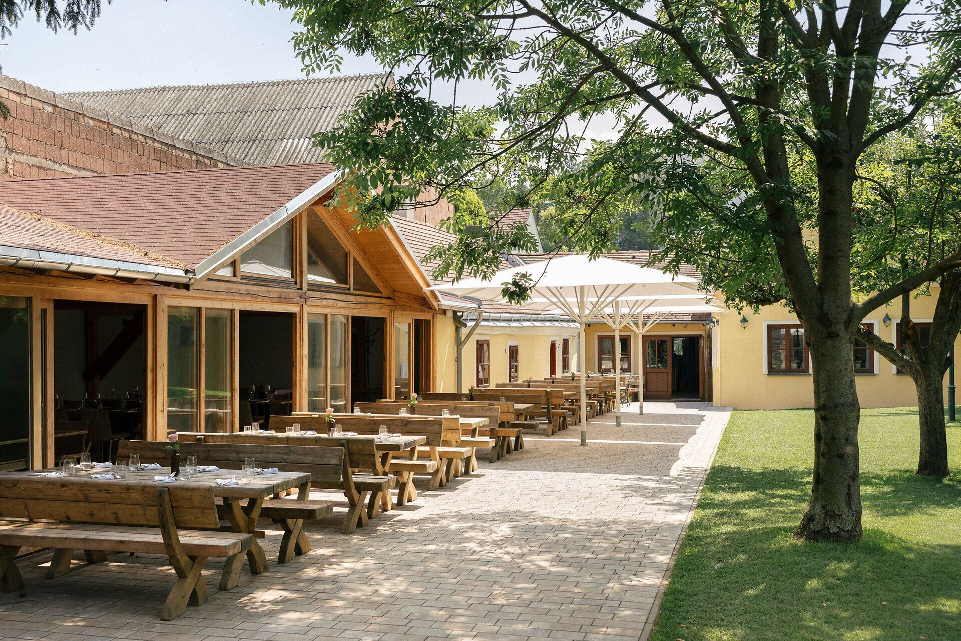 Outdoor dining area with wooden furniture
