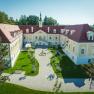 Aerial view of Haindorf Castle with inner courtyard and garden.