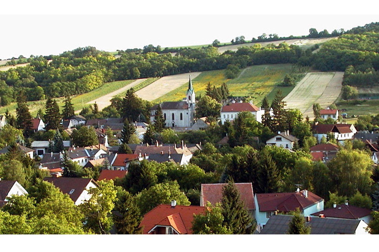 Landscape with village and church in Unterolberndorf.