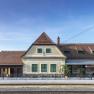 Dürnstein station with historic building and tracks in the foreground.