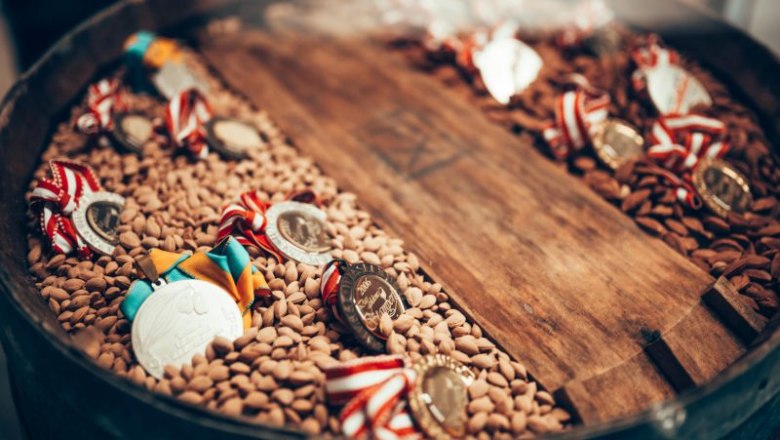 Medals on a barrel of grain.