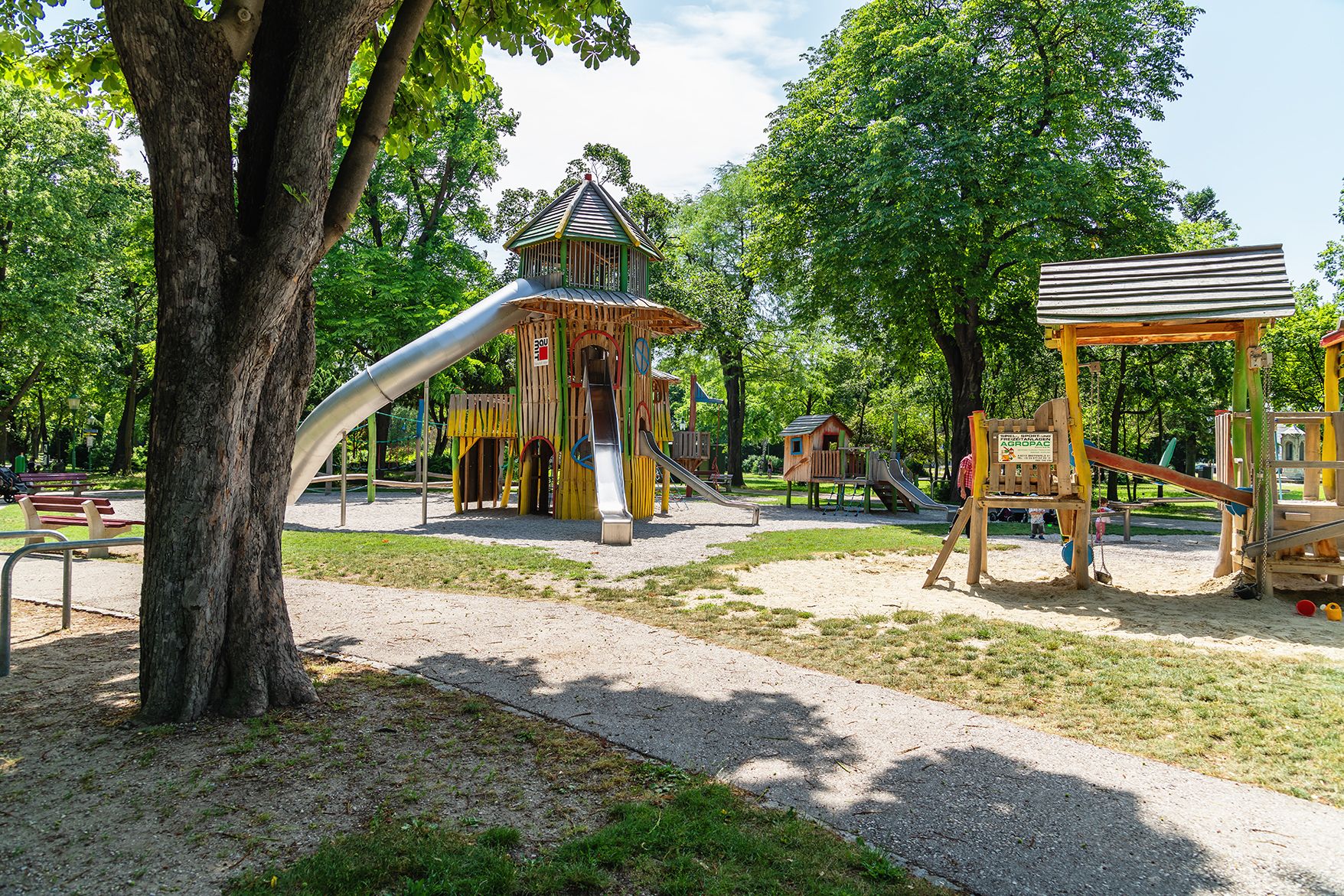 Large children's playground with slide and climbing frame