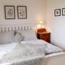 Comfortable double bed in the bedroom, &copy; U.E.