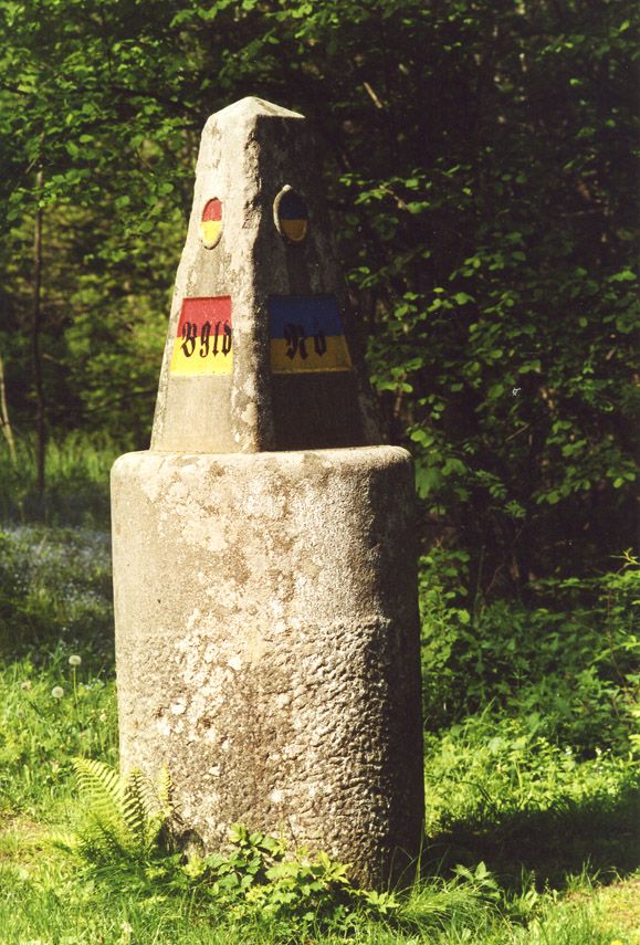 A three-country stone in the forest that marks the border between Burgenland, Lower Austria and Styria.