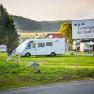Campsite in Melk with mobile homes and a sign in the foreground.