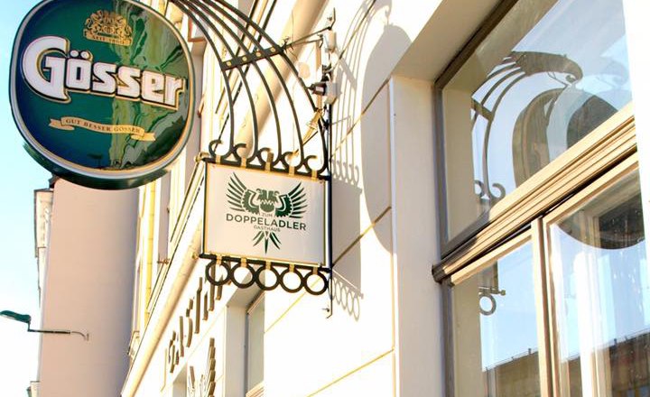 Sign of the Gasthaus zum Doppeladler with G&ouml;sser shield.