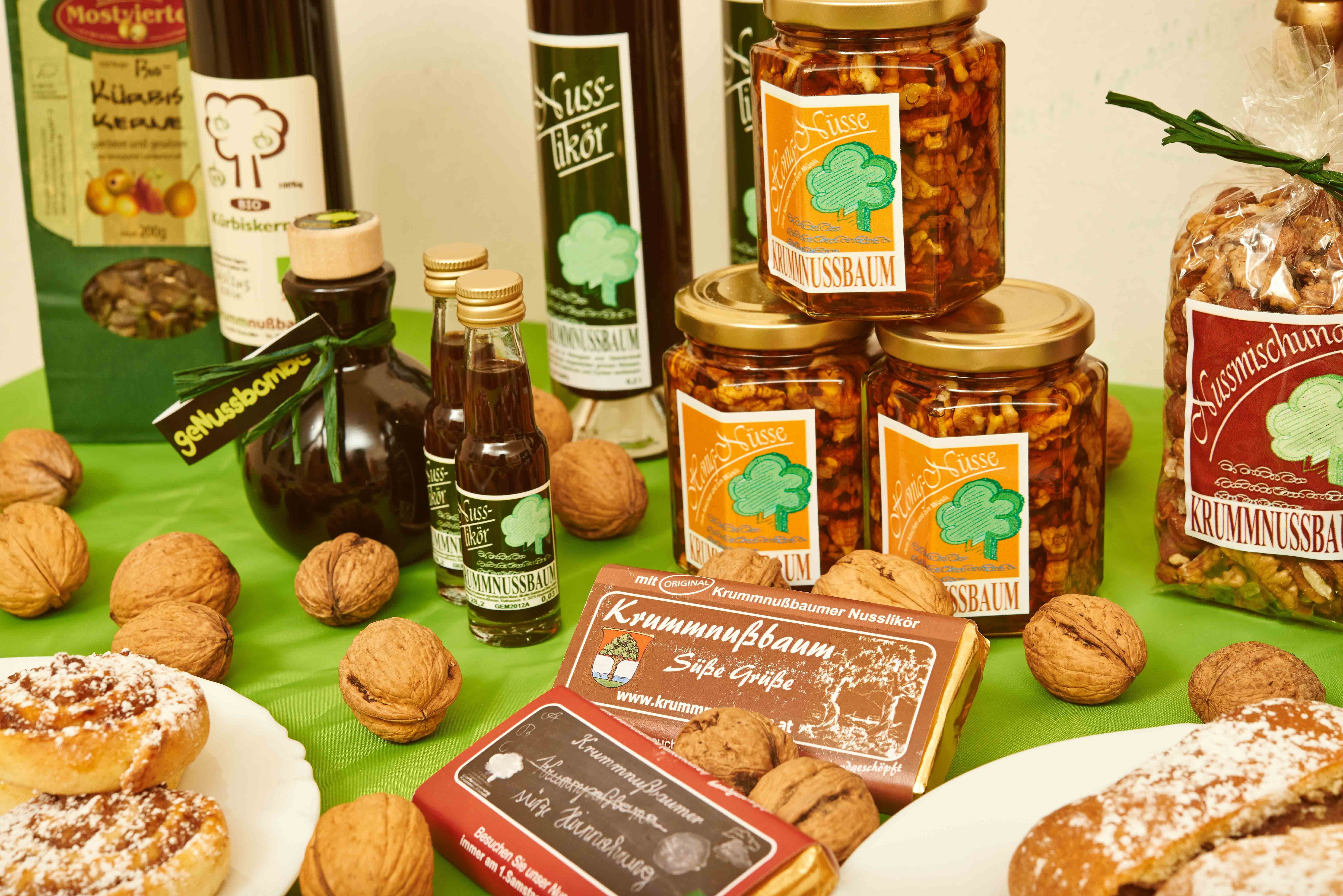 Various walnut products from Krummnussbaum arranged on a table.